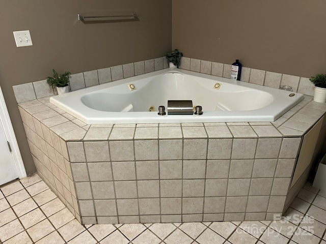 259 Oakland Heights Rd, Forest City, NC 28043 - bathroom with tile patterned flooring and a tub with jets