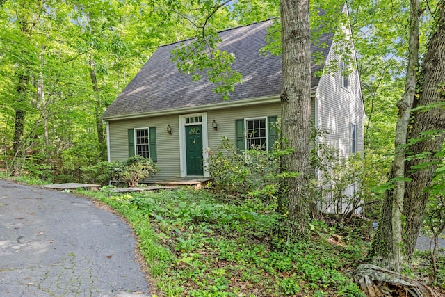 124 Hilltop Rd, Black Mountain, NC 28711 - cape cod-style house featuring roof with shingles