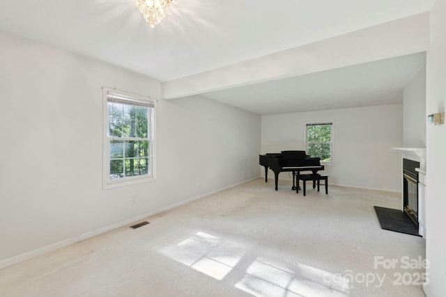124 Hilltop Rd, Black Mountain, NC 28711 - living area featuring a fireplace with flush hearth, carpet, baseboards, and a chandelier