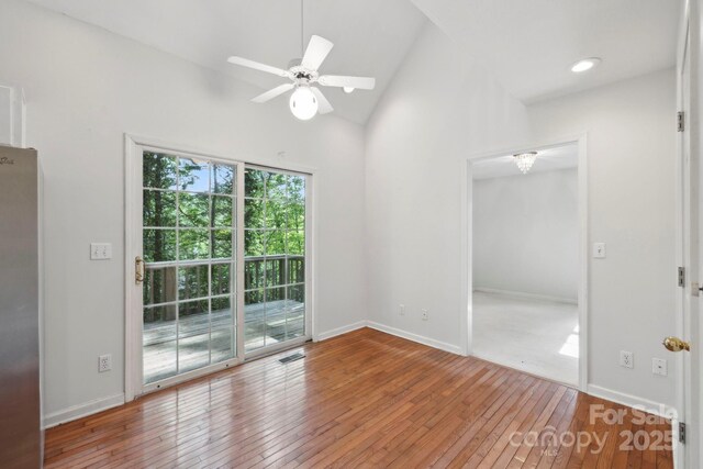 124 Hilltop Rd, Black Mountain, NC 28711 - spare room featuring wood-type flooring, ceiling fan, lofted ceiling, and baseboards