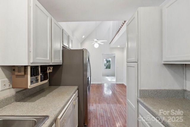 124 Hilltop Rd, Black Mountain, NC 28711 - kitchen featuring lofted ceiling, dishwasher, ceiling fan, white cabinetry, and light countertops