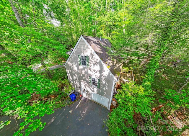 124 Hilltop Rd, Black Mountain, NC 28711 - view of outbuilding with asphalt driveway and an attached garage