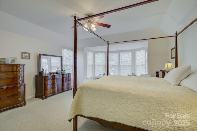 12125 Mountainside Ln, Charlotte, NC 28278 - carpeted bedroom featuring multiple windows and a ceiling fan