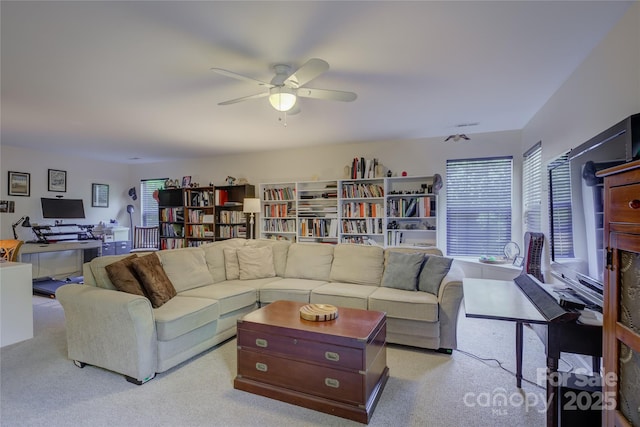 12125 Mountainside Ln, Charlotte, NC 28278 - living room with a ceiling fan and carpet floors