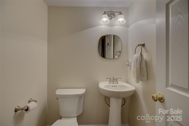 12125 Mountainside Ln, Charlotte, NC 28278 - half bath with toilet and a sink