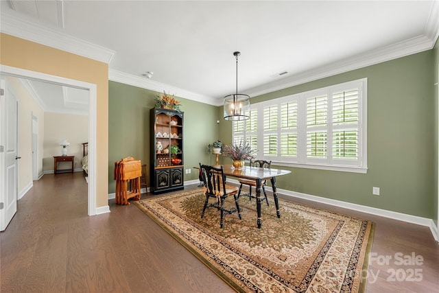 17028 River Race Dr, Huntersville, NC 28078 - dining space featuring dark wood-type flooring, ornamental molding, and baseboards