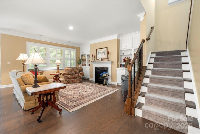 17028 River Race Dr, Huntersville, NC 28078 - living room featuring stairway, a fireplace, crown molding, dark wood-type flooring, and baseboards
