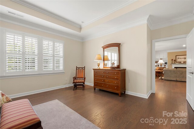17028 River Race Dr, Huntersville, NC 28078 - living area featuring wood finished floors, ornamental molding, and baseboards