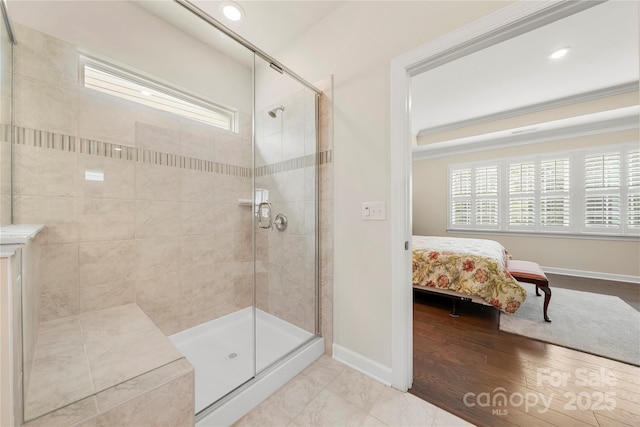 17028 River Race Dr, Huntersville, NC 28078 - bathroom featuring a stall shower, baseboards, crown molding, recessed lighting, and connected bathroom