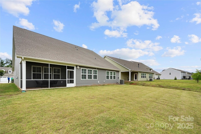 17028 River Race Dr, Huntersville, NC 28078 - rear view of property with a lawn, a sunroom, central air condition unit, and roof with shingles