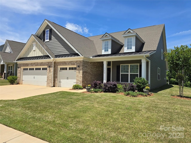 17028 River Race Dr, Huntersville, NC 28078 - view of front of property featuring a standing seam roof, driveway, a front yard, brick siding, and metal roof