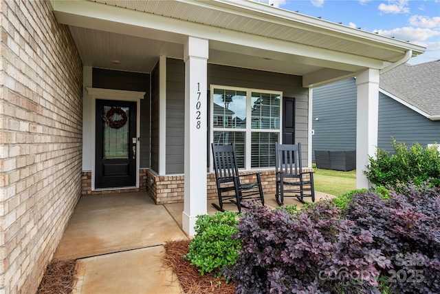 17028 River Race Dr, Huntersville, NC 28078 - doorway to property featuring covered porch