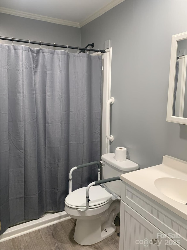 304 W Miller St, Jefferson, SC 29718 - full bath with wood finished floors, toilet, vanity, a shower with shower curtain, and crown molding