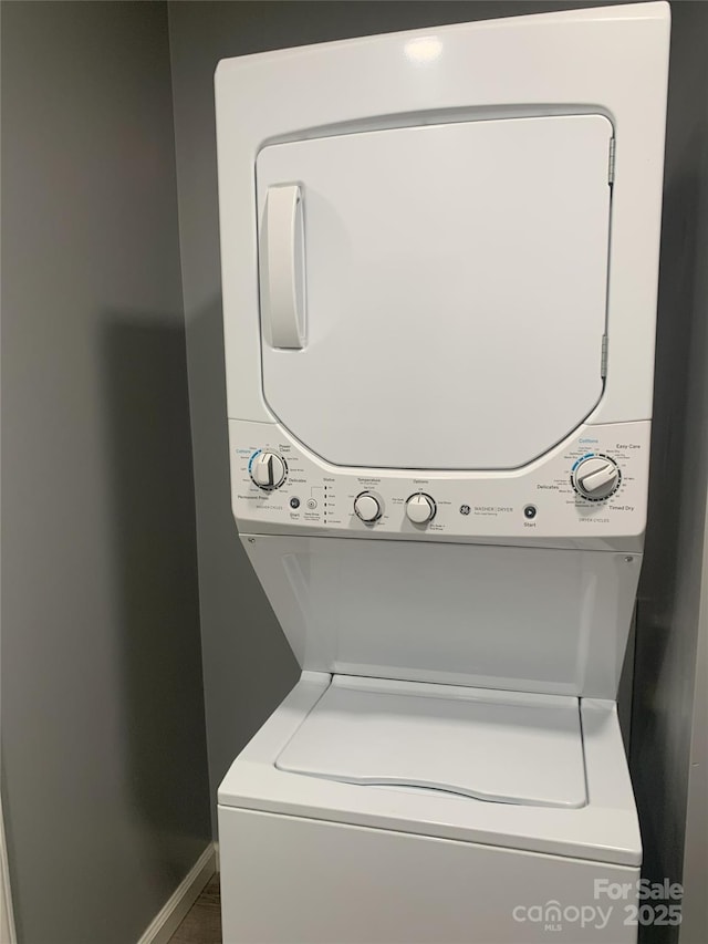 304 W Miller St, Jefferson, SC 29718 - laundry room featuring stacked washer / dryer and baseboards