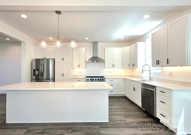 690 Settlers Trl, Mars Hill, NC 28754 - kitchen with wall chimney range hood, stainless steel appliances, a sink, a center island, and dark wood-style flooring