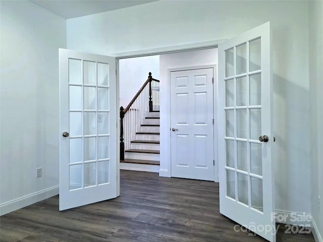 690 Settlers Trl, Mars Hill, NC 28754 - spare room with dark wood-style flooring, stairway, and baseboards