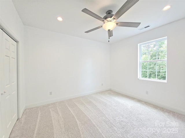 690 Settlers Trl, Mars Hill, NC 28754 - unfurnished bedroom with baseboards, light colored carpet, recessed lighting, and a ceiling fan