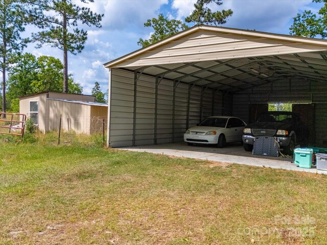 2675 Andrews Cir, Aiken, SC 29803 - view of parking / parking lot with a detached carport and driveway