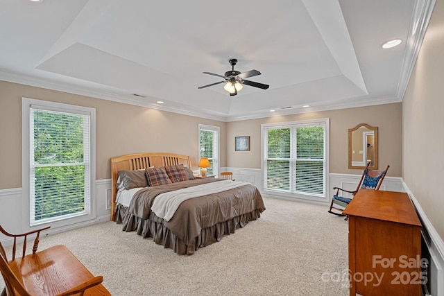 166 Pinnacle Shores Dr, Mooresville, NC 28117 - carpeted bedroom with a raised ceiling, a wainscoted wall, ornamental molding, a decorative wall, and ceiling fan