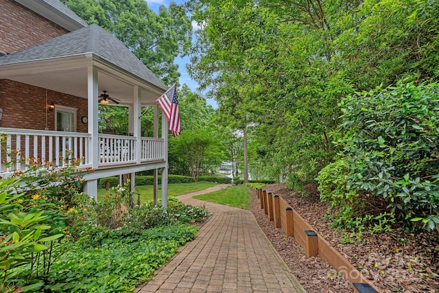 166 Pinnacle Shores Dr, Mooresville, NC 28117 - view of yard featuring a ceiling fan and a porch