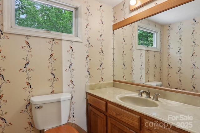 19 Reuben Branch Rd, Maggie Valley, NC 28751 - bathroom with toilet, vanity, and wallpapered walls
