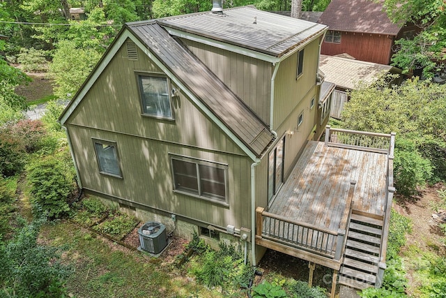19 Reuben Branch Rd, Maggie Valley, NC 28751 - view of property exterior with central AC unit, metal roof, a deck, and stairs