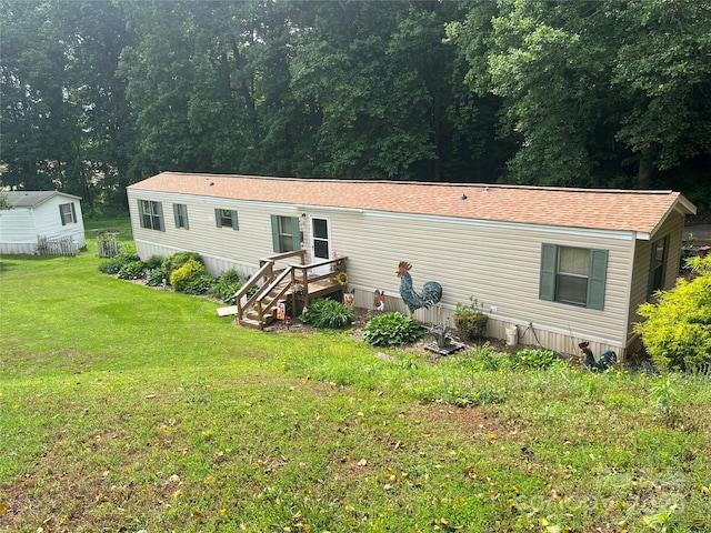 2165 Peanuts Ln, Newton, NC 28658 - rear view of house with a lawn and a view of trees