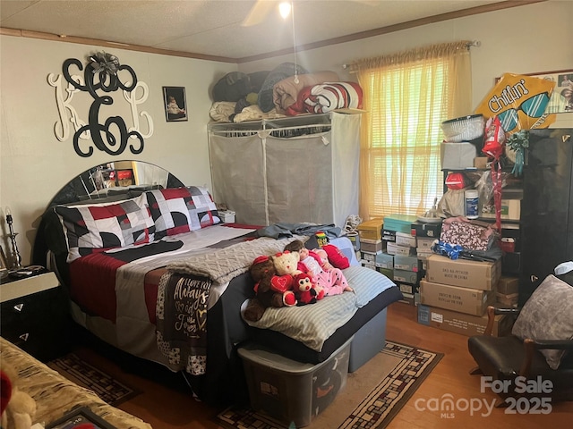 2165 Peanuts Ln, Newton, NC 28658 - bedroom featuring crown molding and wood finished floors