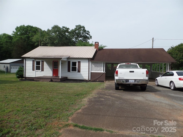 5004 King Wilkinson Rd, Denver, NC 28037 - ranch-style house featuring asphalt driveway, a front lawn, a chimney, metal roof, and an attached carport