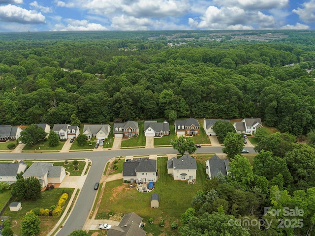 5748 Timbertop Ln, Charlotte, NC 28215 - aerial view of property and surrounding area featuring a forest and nearby suburban area