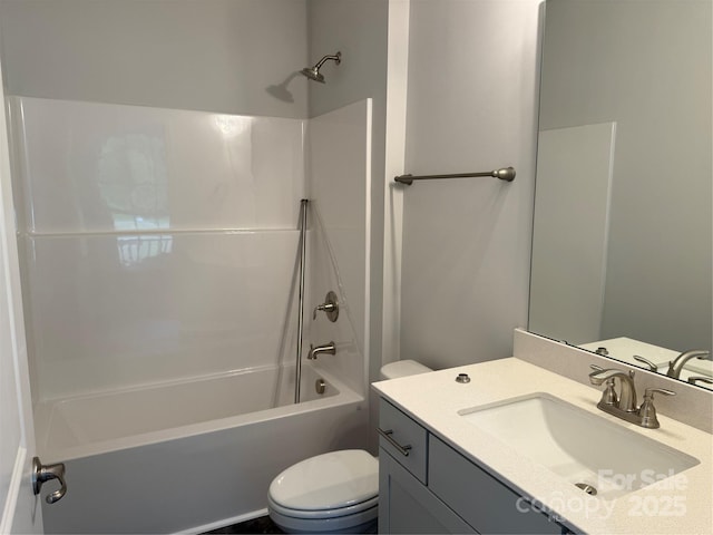 full bath with toilet, vanity, and washtub / shower combination