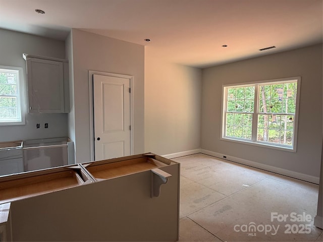 kitchen featuring baseboards