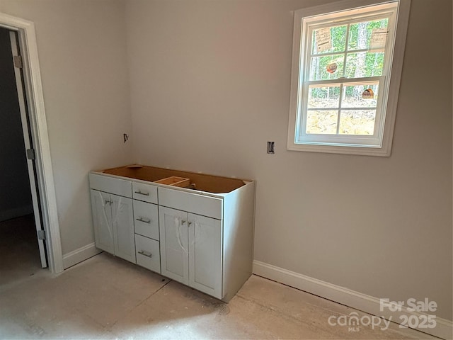 bathroom featuring baseboards