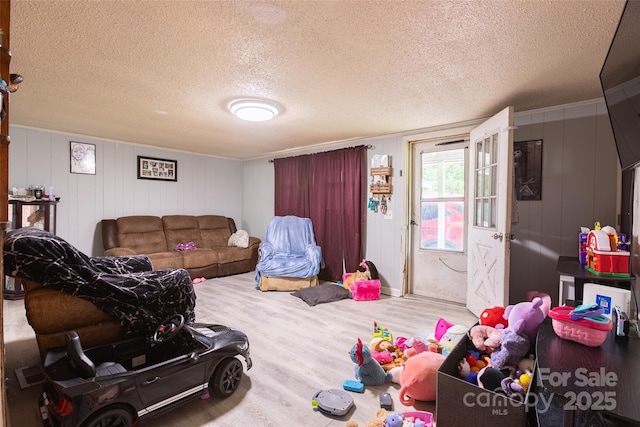 100 Lanier St, Mount Holly, NC 28120 - living area featuring wood finished floors and a textured ceiling