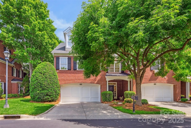 3128 Ethereal Ln, Charlotte, NC 28226 - view of front of house with brick siding, a garage, and driveway