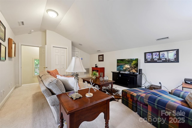 3128 Ethereal Ln, Charlotte, NC 28226 - living room with vaulted ceiling, light colored carpet, and baseboards