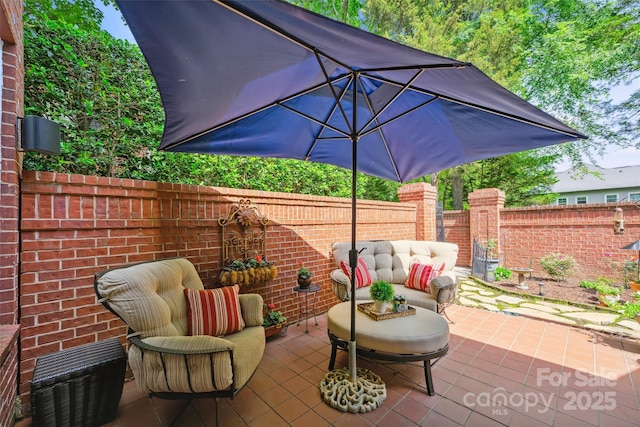 3128 Ethereal Ln, Charlotte, NC 28226 - fenced backyard with a patio area and an outdoor living space