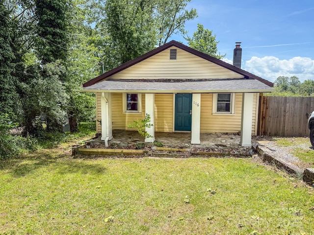 116 N Blue Ridge Ave, Hendersonville, NC 28792 - view of front facade with roof with shingles, a chimney, and a porch