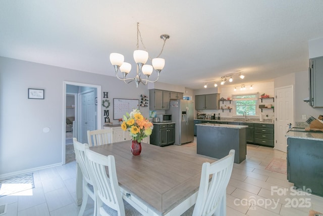 1739 Lesa Lin Dr, Monroe, NC 28112 - dining room with a chandelier