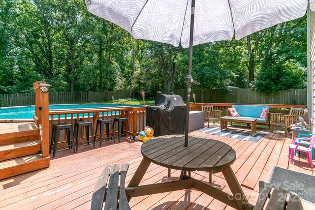 1739 Lesa Lin Dr, Monroe, NC 28112 - wooden terrace with a fenced backyard