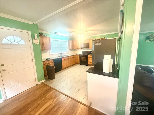 2601 Marldale St, Gastonia, NC 28052 - kitchen featuring black appliances, a sink, crown molding, light wood-style floors, and ceiling fan