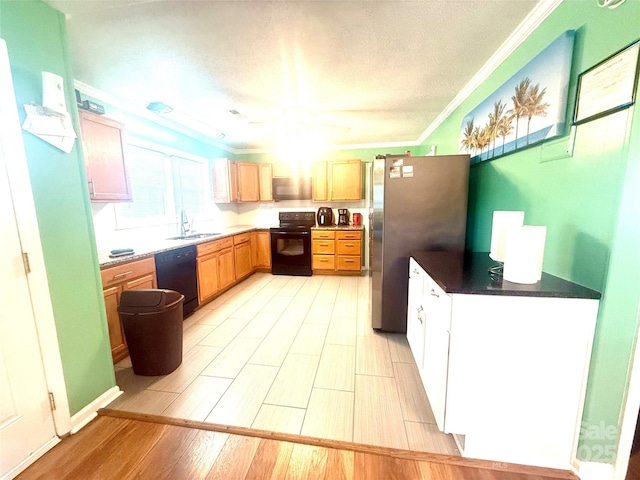 2601 Marldale St, Gastonia, NC 28052 - kitchen with black appliances, a sink, a textured ceiling, ornamental molding, and light wood-style floors