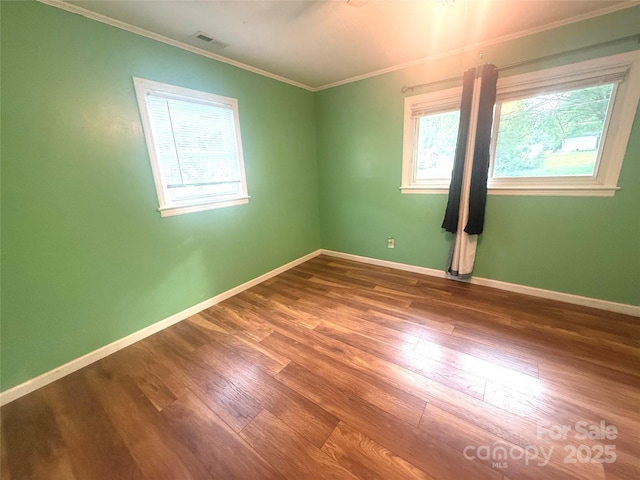 2601 Marldale St, Gastonia, NC 28052 - unfurnished room featuring wood finished floors, crown molding, and baseboards