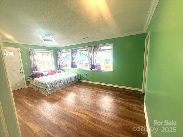 2601 Marldale St, Gastonia, NC 28052 - bedroom featuring ornamental molding, wood finished floors, baseboards, and a textured ceiling