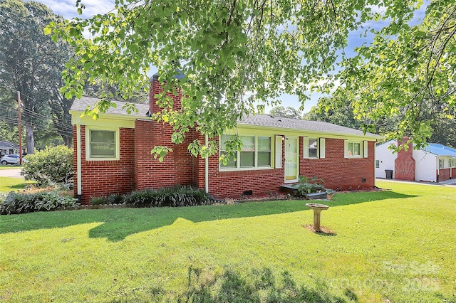 2601 Marldale St, Gastonia, NC 28052 - view of front of home with a front yard, brick siding, a chimney, and crawl space