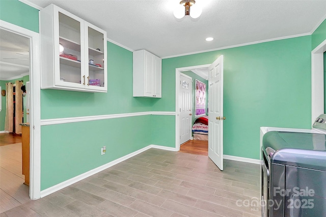 2601 Marldale St, Gastonia, NC 28052 - laundry room with crown molding, independent washer and dryer, light wood-style flooring, a textured ceiling, and recessed lighting