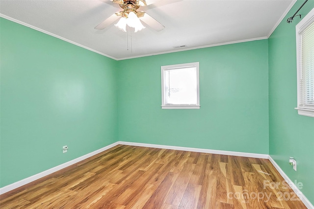 2601 Marldale St, Gastonia, NC 28052 - unfurnished room featuring wood finished floors, crown molding, and a ceiling fan
