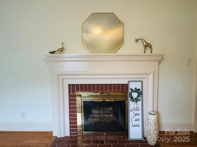 2357 28th St NE, Hickory, NC 28601 - detailed view of a brick fireplace and baseboards