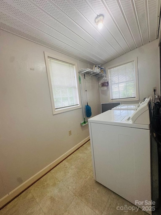 2357 28th St NE, Hickory, NC 28601 - laundry area featuring washer and clothes dryer and baseboards