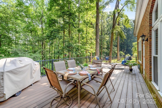 122 Waterford Dr, Mooresville, NC 28117 - deck with outdoor dining space and a grill